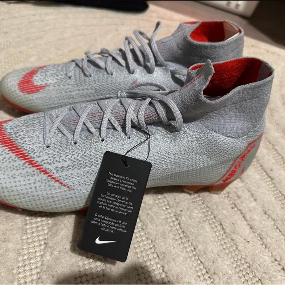 Nike Silver and Red High-Top Soccer Cleats